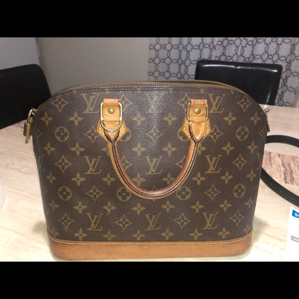Louis Vuitton Alma Handbag